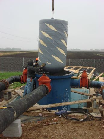 54 inch C4-R pig being inserted into launcher to clean 50 miles of raw water pipeline
